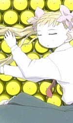 Kasumi asleep on a bed of yellow circles.